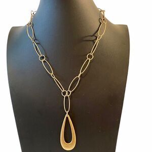 Axcess Large Gold Toned Teardrop Pendant on unique chain.